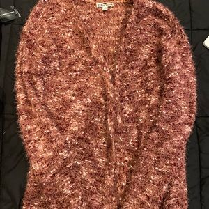 Pink cardigan perfect for winter.